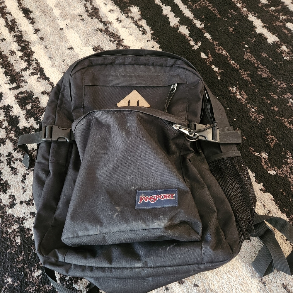 Black Jansport Backpack fits books/Folders and homework or Ipad